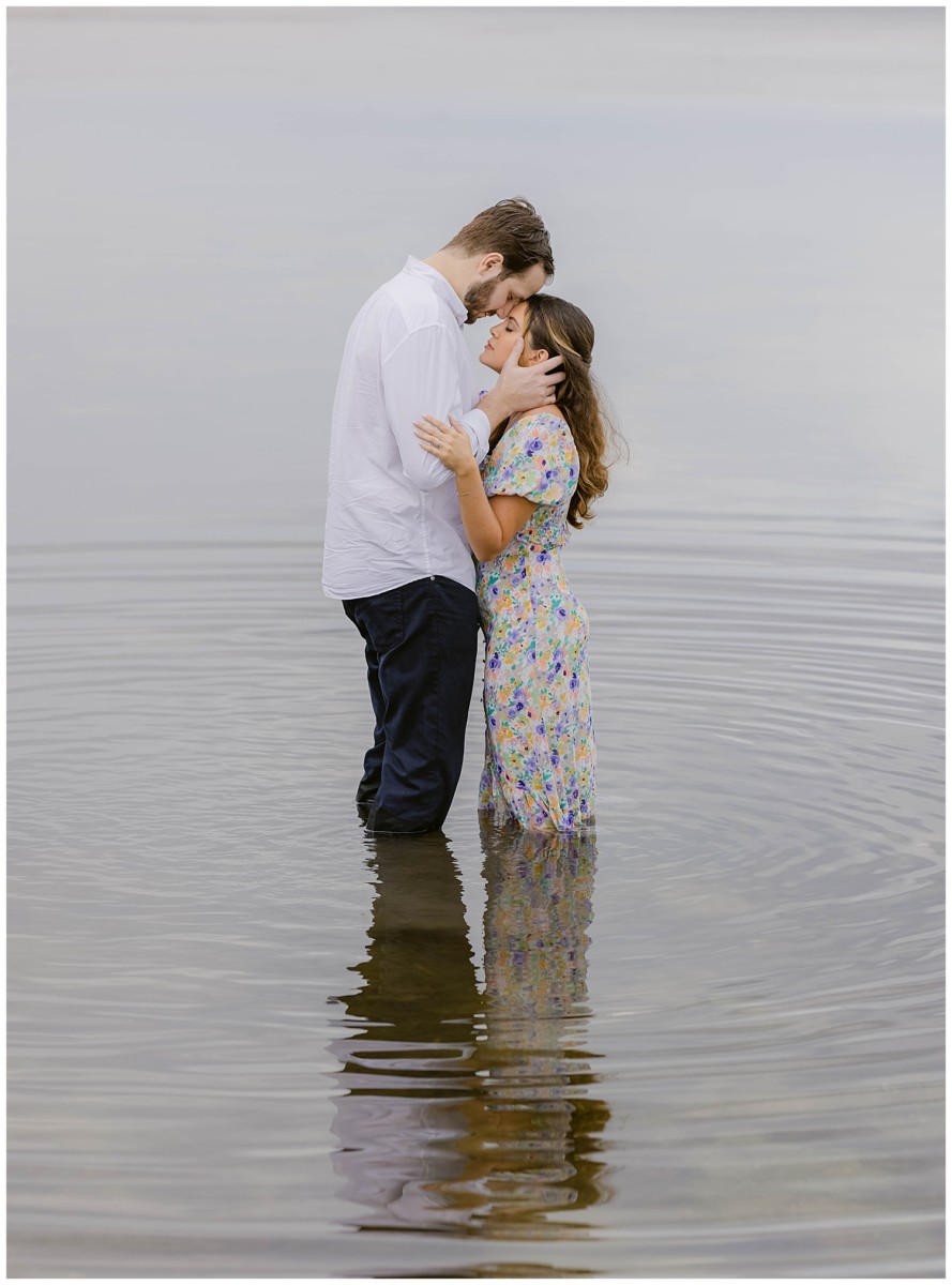 Romantic Miami Engagement Photooshot - Couple embracing in the water